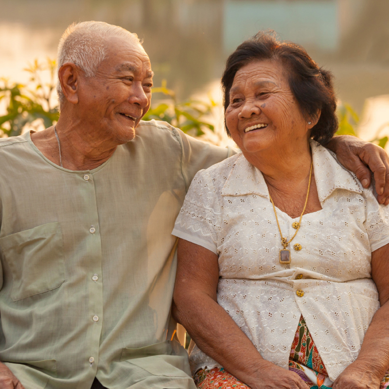 elderly couple on bench